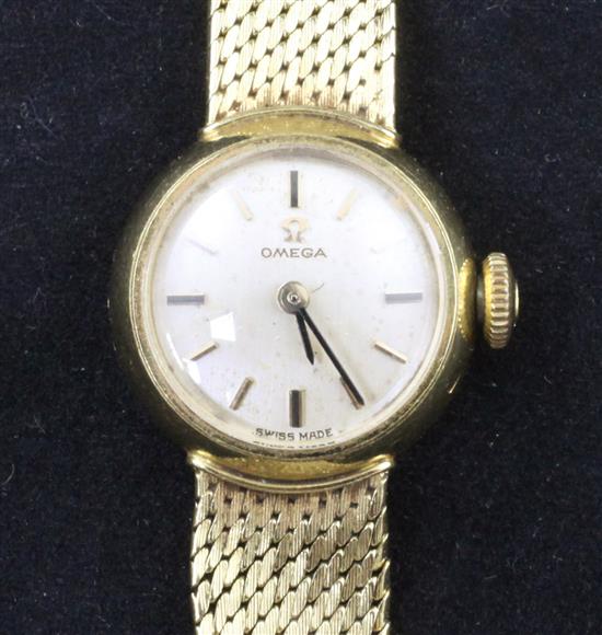 A ladys 1960s 18ct gold Omega manual wind wrist watch,
